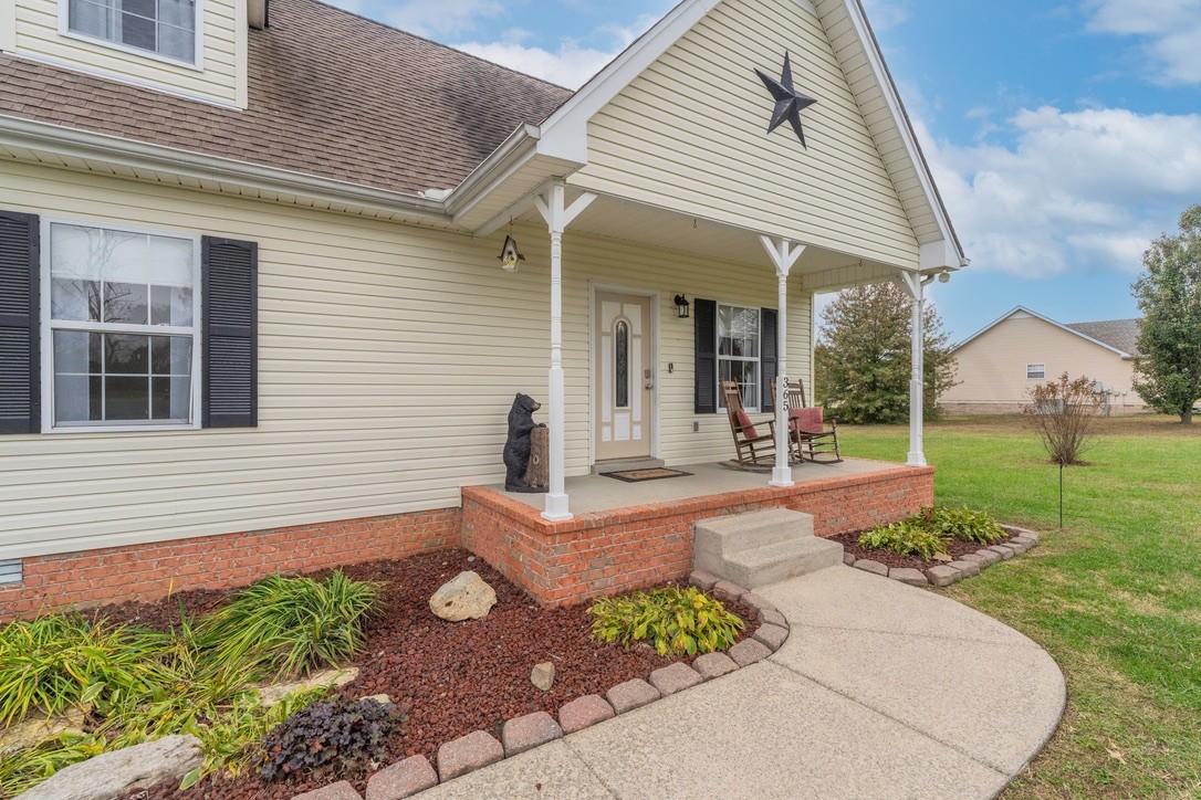 365 Corinth Road Portland, TN 37148 - Photo 3 of 20 a front view of a house with garden