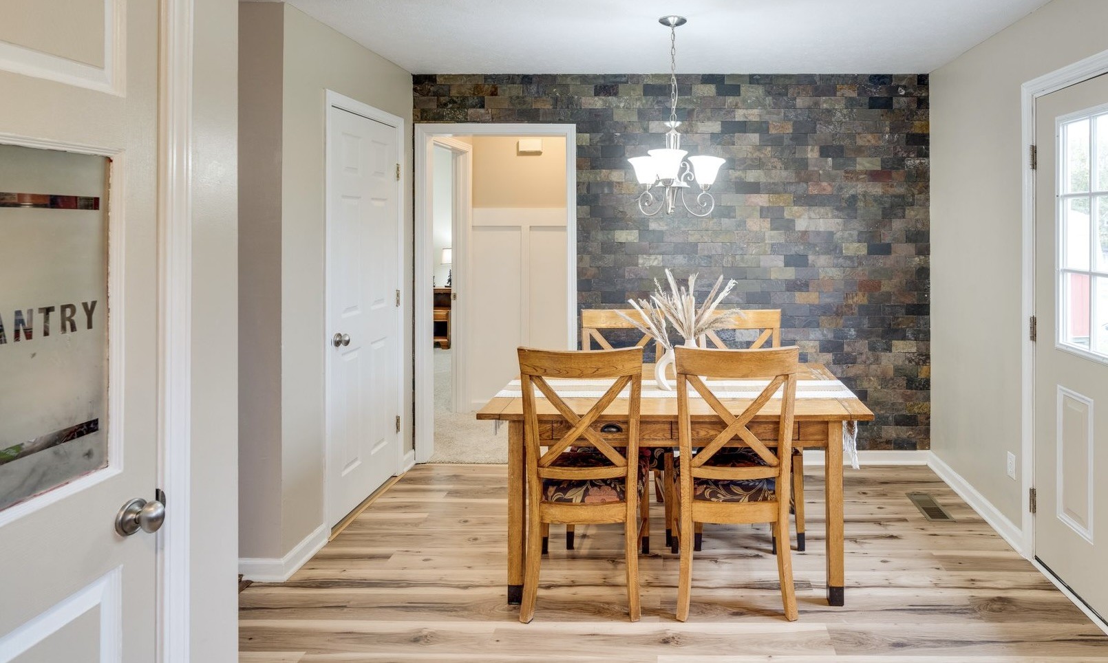 365 Corinth Road Portland, TN 37148 - Photo 8 of 20 a view of a dining room with furniture and wooden floor