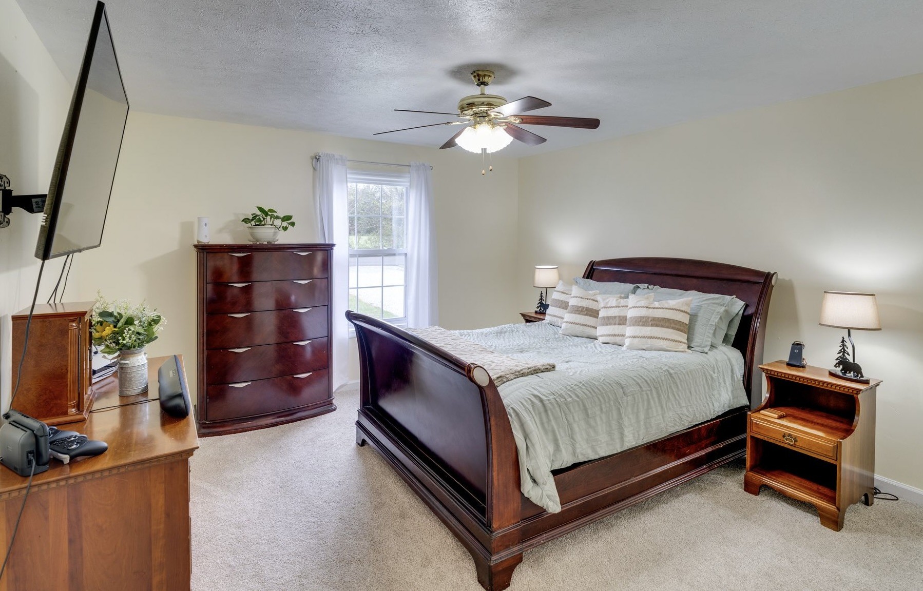 365 Corinth Road Portland, TN 37148 - Photo 9 of 20 a bedroom with a bed and a dresser