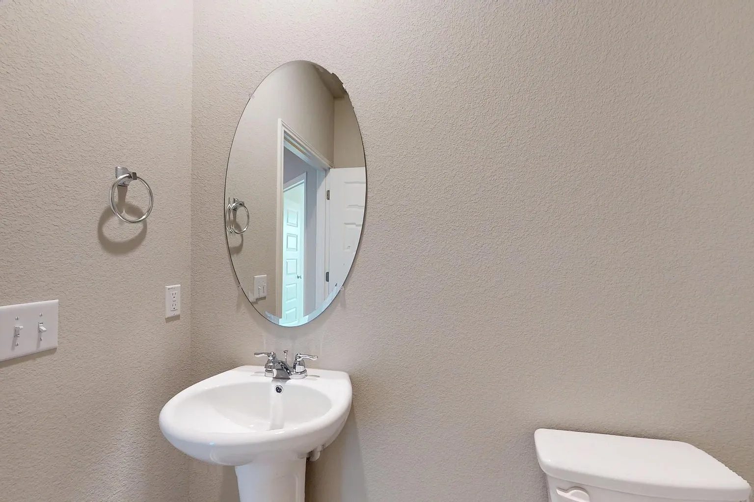 12112 Dillon Fls Drive Austin, TX 78747 - Photo 3 of 31 Half bathroom with toilet and a textured wall