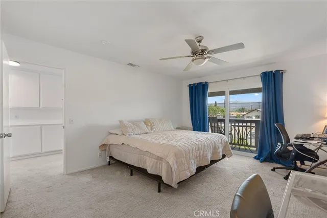 a view of balcony with furniture