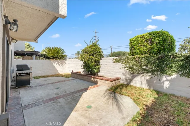 a view of a yard with an outdoor space
