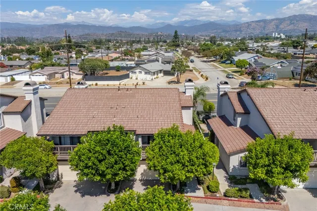an aerial view of a city with lots of residential buildings
