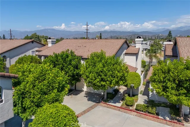 an aerial view of a city with lots of residential buildings