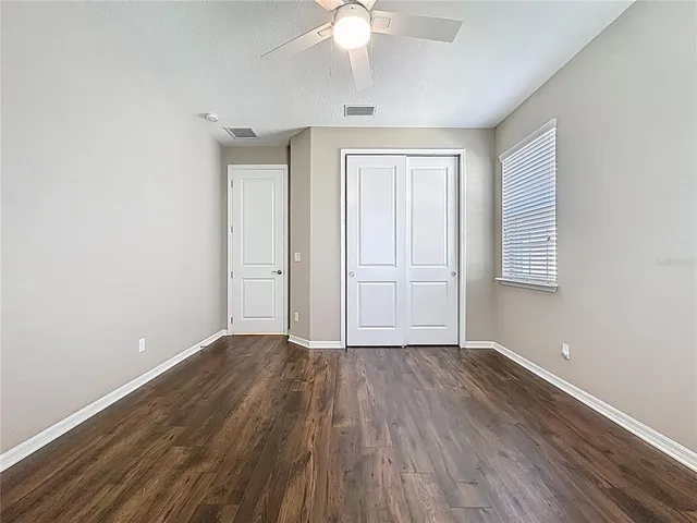 a living room with furniture a fireplace and a table