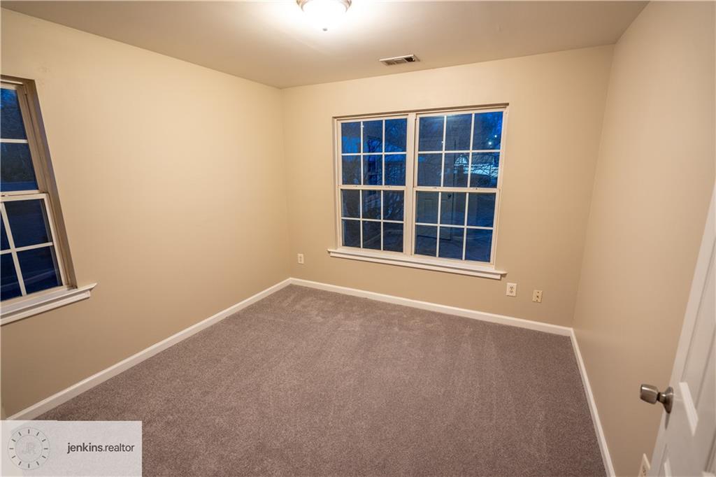 1188 Ira Street Southwest Atlanta, GA 30310 - Photo 18 of 33 a view of an empty room with a window