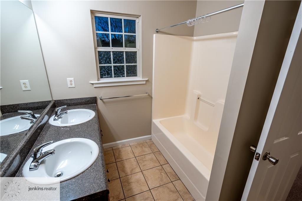 1188 Ira Street Southwest Atlanta, GA 30310 - Photo 25 of 33 a bathroom with a sink and a mirror