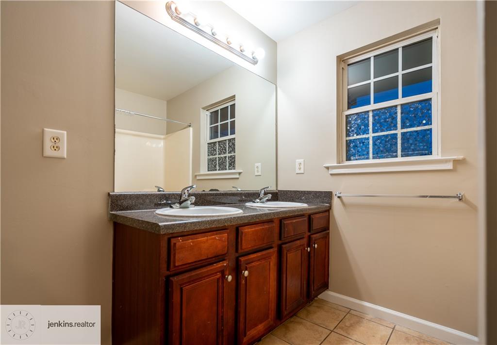 1188 Ira Street Southwest Atlanta, GA 30310 - Photo 27 of 33 a view of a bathroom sink and a window