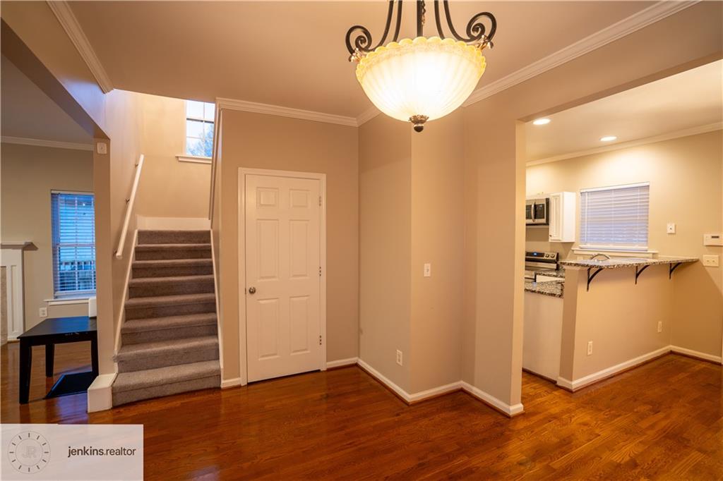 1188 Ira Street Southwest Atlanta, GA 30310 - Photo 4 of 33 a view of a room with wooden floor and entryway