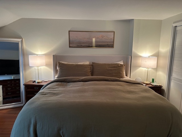 100 Rising Trail Drive, Unit 100 Middletown, CT 06457 - Photo 21 of 33 a bedroom with a bed and a night stand