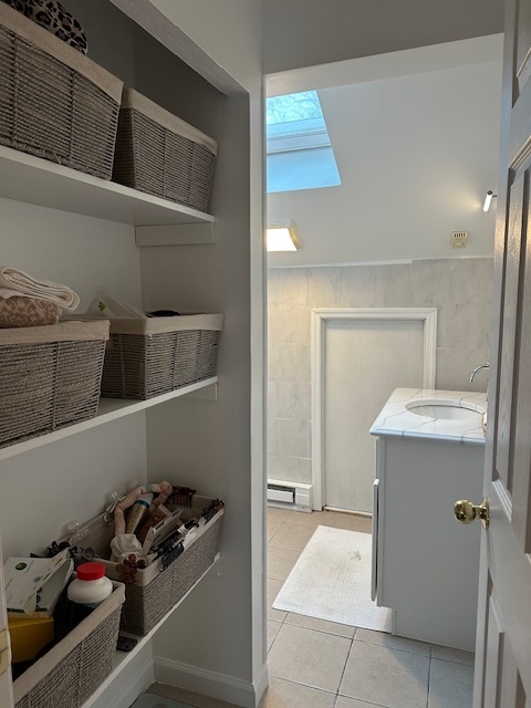 100 Rising Trail Drive, Unit 100 Middletown, CT 06457 - Photo 25 of 33 a kitchen with a cabinets and white appliances