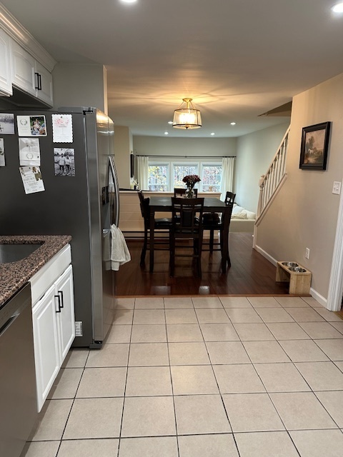 100 Rising Trail Drive, Unit 100 Middletown, CT 06457 - Photo 3 of 33 a kitchen with stainless steel appliances a stove a refrigerator and microwave