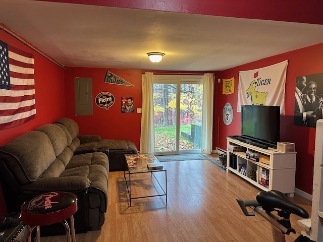 100 Rising Trail Drive, Unit 100 Middletown, CT 06457 - Photo 33 of 33 a living room with furniture and a flat screen tv