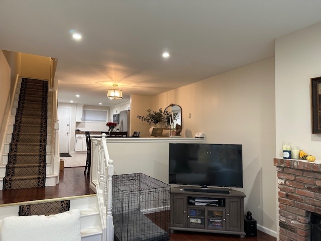 100 Rising Trail Drive, Unit 100 Middletown, CT 06457 - Photo 10 of 33 a living room with furniture and a flat screen tv