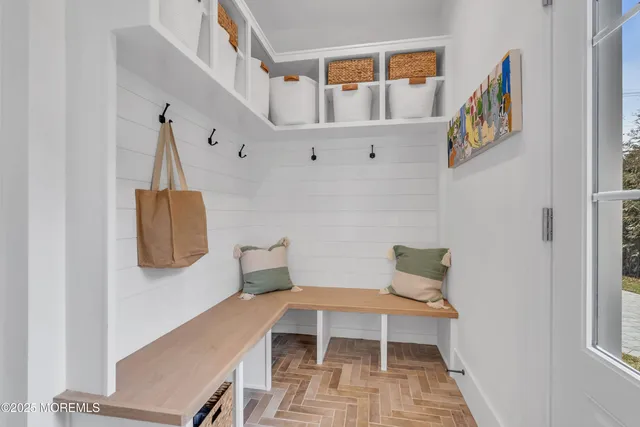 an aerial view of a house with a ocean view