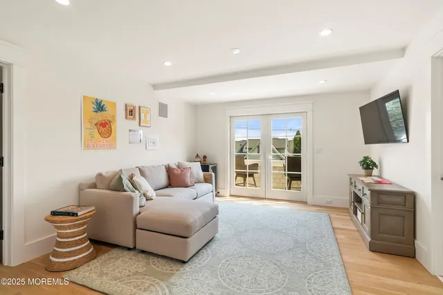 an aerial view of a house with a ocean view