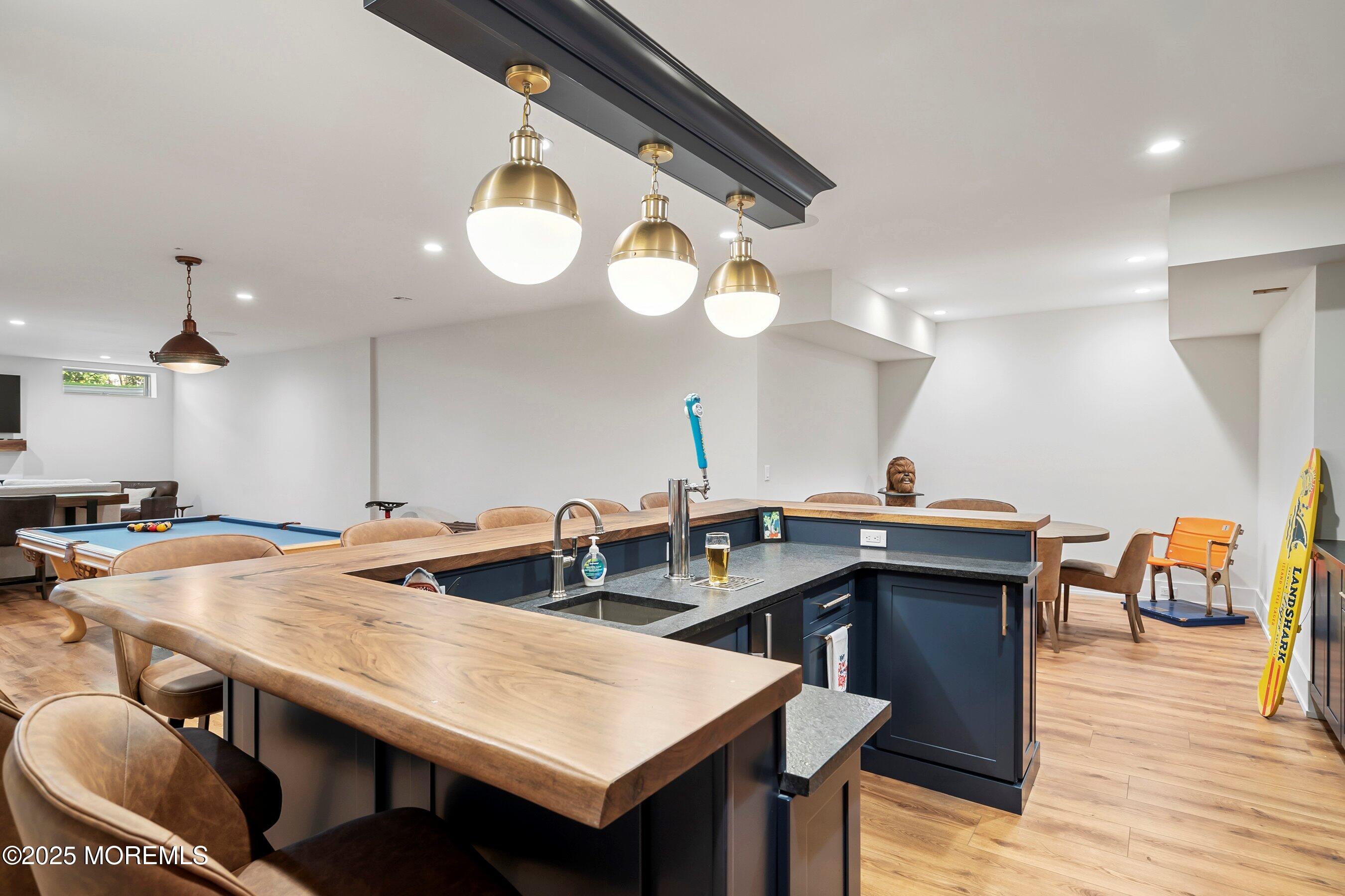 205 Morris Avenue Spring Lake, NJ 07762 - Photo 44 of 105 a kitchen with a table and chairs in it