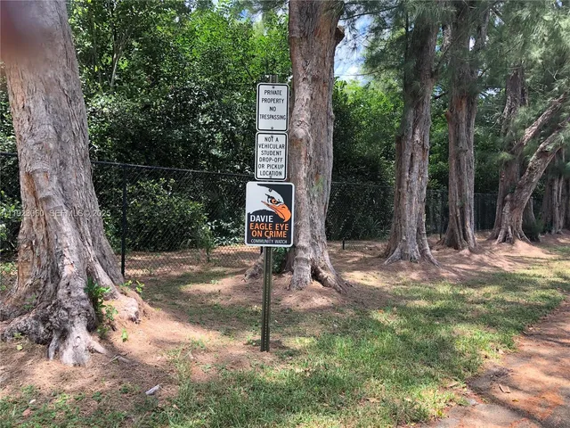a kitchen with cabinets appliances and a sink