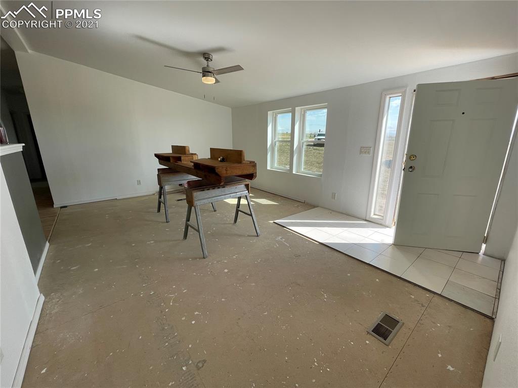 7540 Boone Road Yoder, CO 80864 - Photo 19 of 31 a workspace with furniture and window