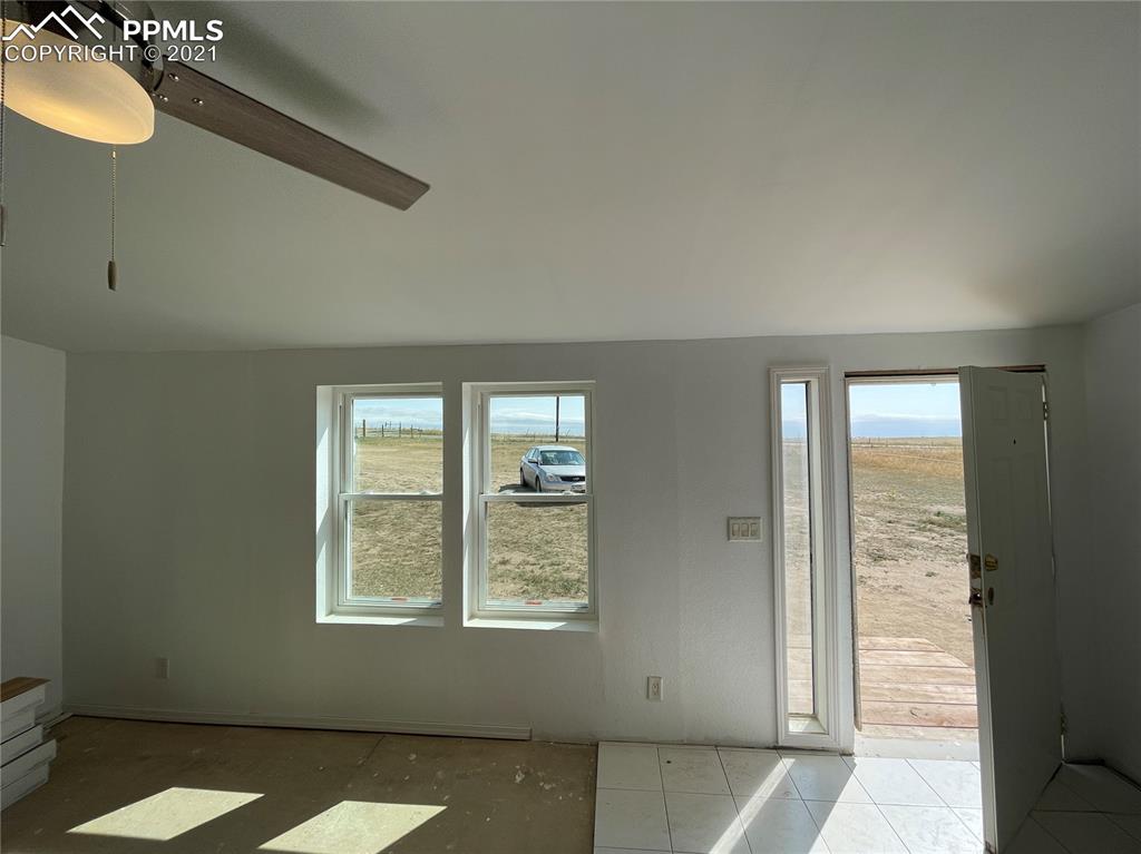 7540 Boone Road Yoder, CO 80864 - Photo 21 of 31 an empty room with windows