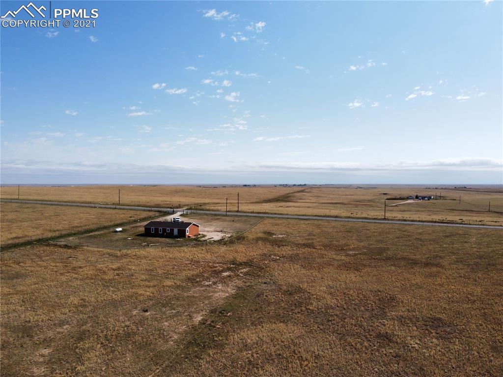 7540 Boone Road Yoder, CO 80864 - Photo 26 of 31 a view of an ocean and beach