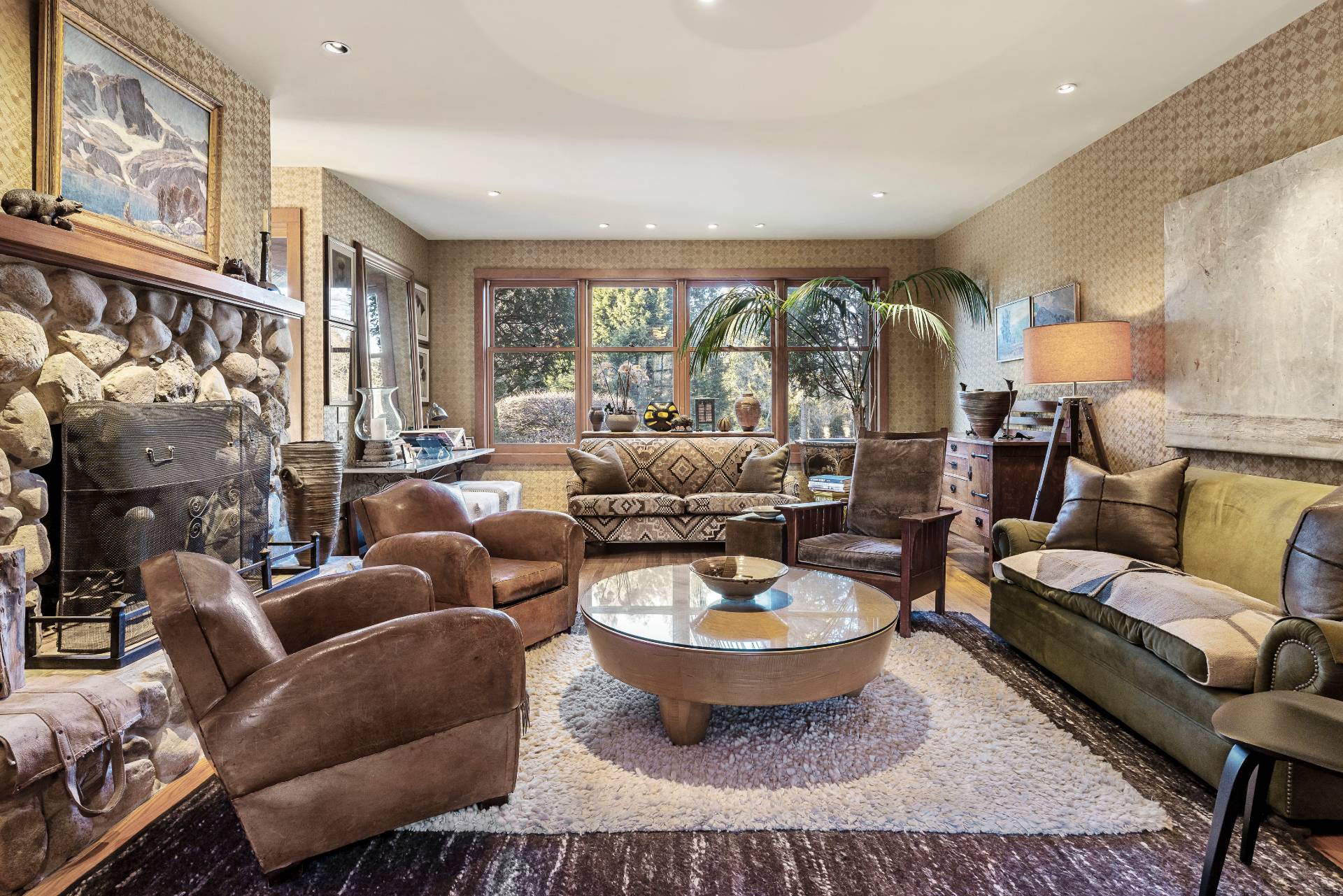 488 Lumber Lane Bridgehampton, NY 11932 - Photo 6 of 21 a living room with furniture a fireplace and a large window