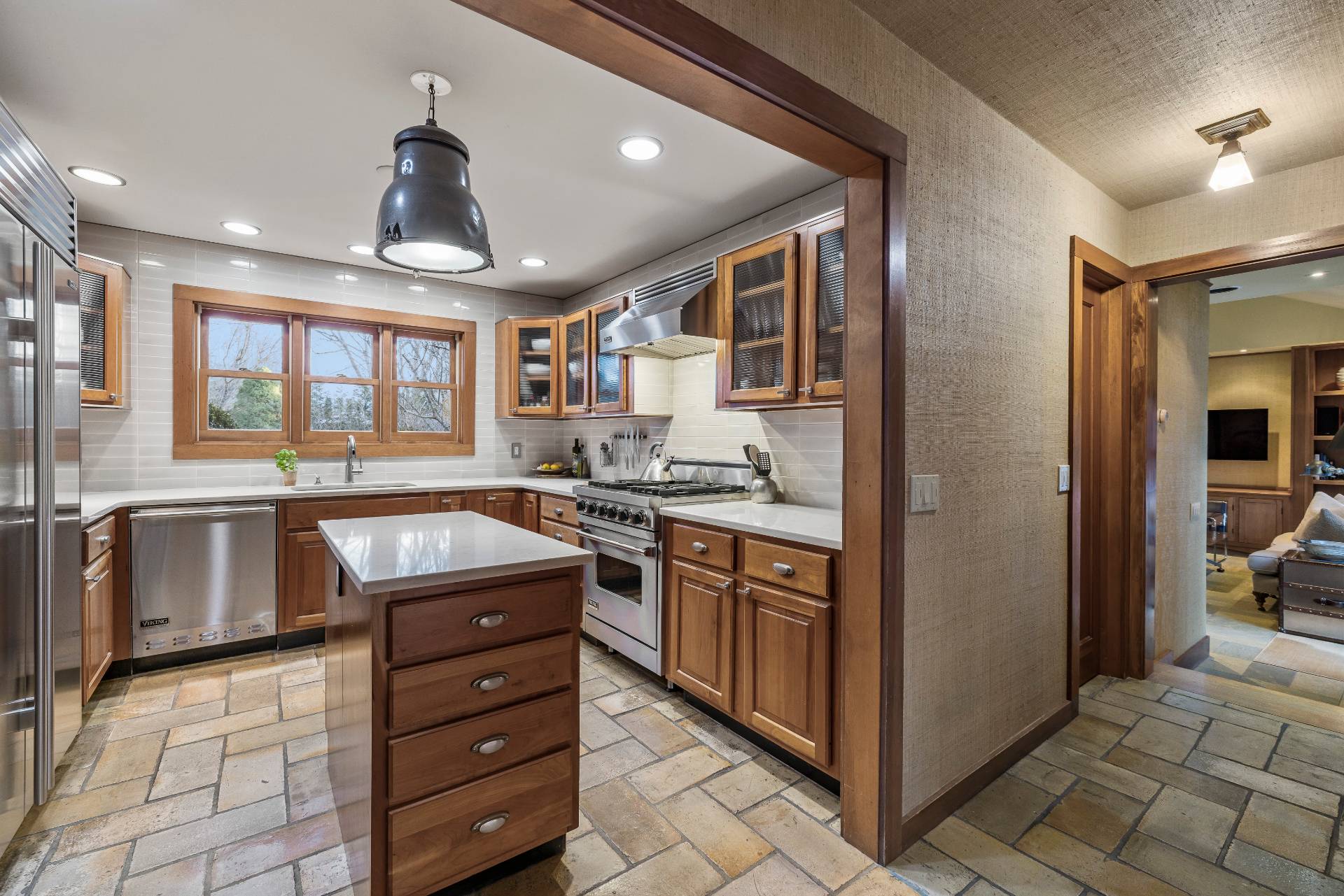 488 Lumber Lane Bridgehampton, NY 11932 - Photo 9 of 21 a large kitchen with kitchen island a large counter space a sink and stainless steel appliances