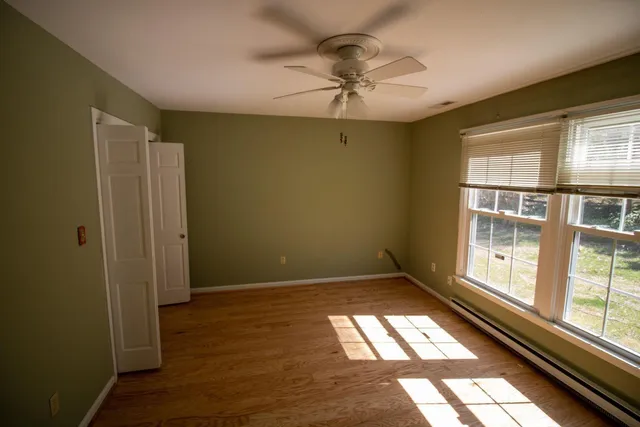 an empty room with windows