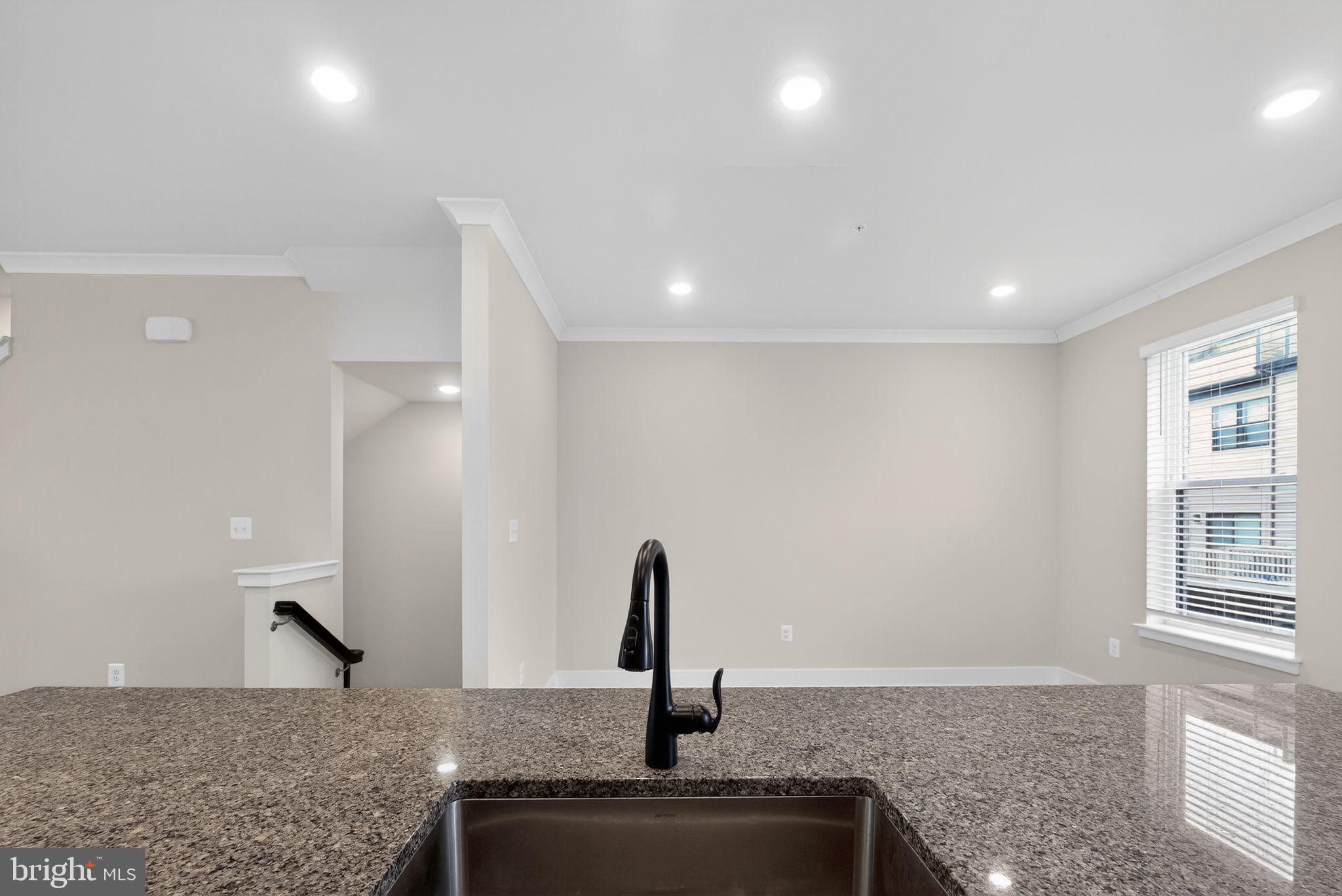 4300 Roland Heights Avenue Baltimore, MD 21211 - Photo 16 of 37 a view of a kitchen with a sink and window