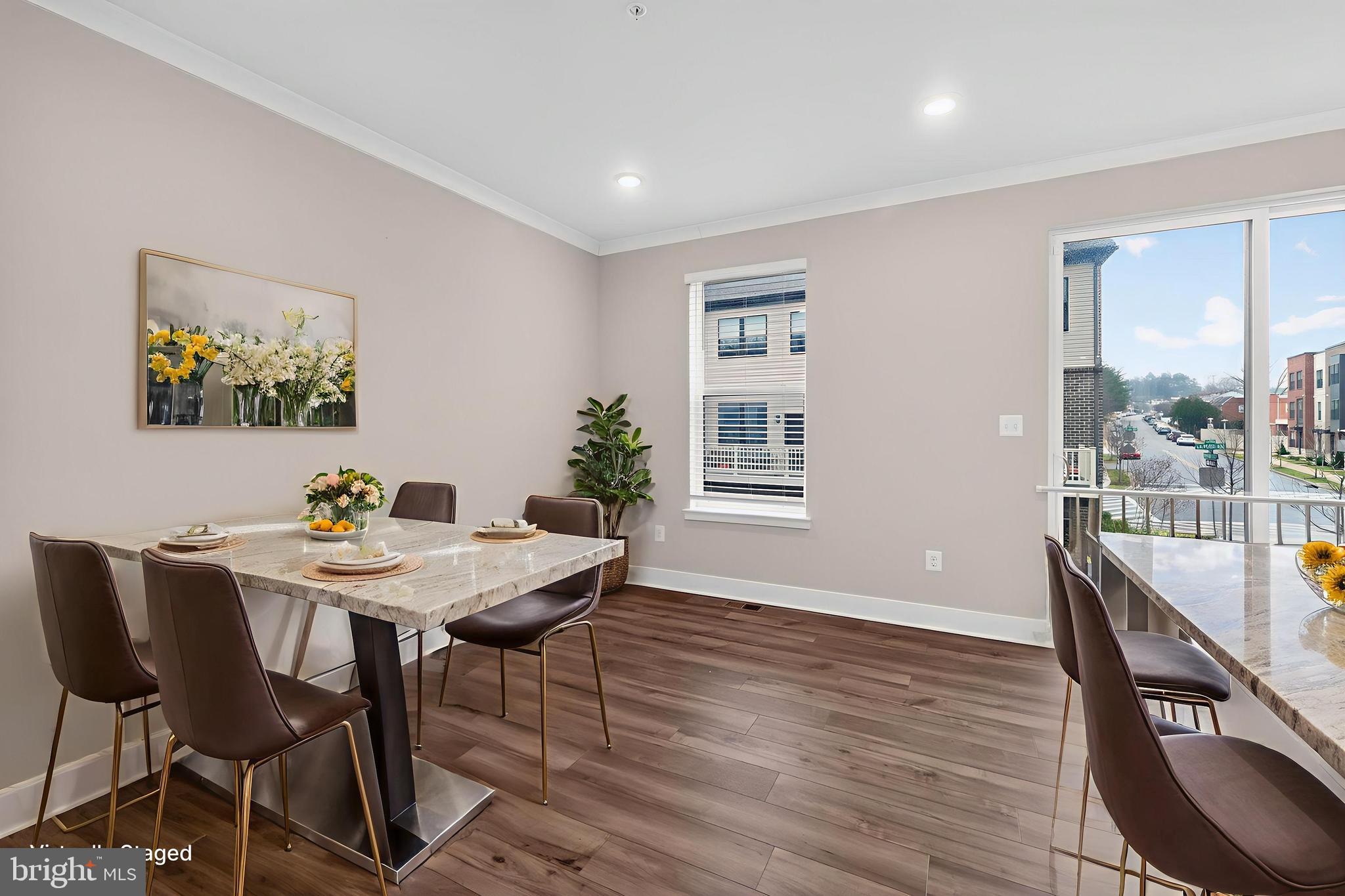 4300 Roland Heights Avenue Baltimore, MD 21211 - Photo 19 of 37 a view of a dining room with furniture window and wooden floor