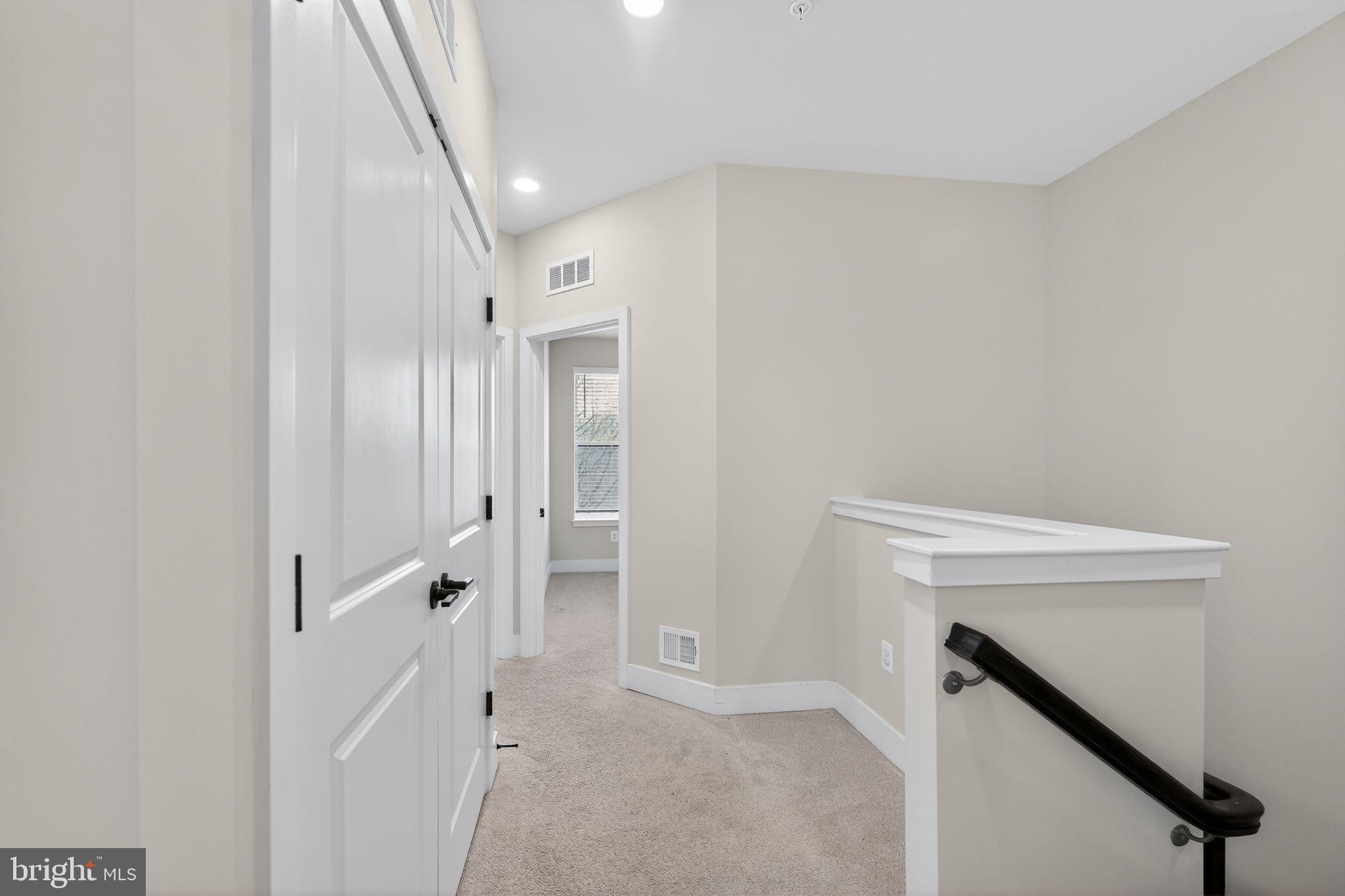 4300 Roland Heights Avenue Baltimore, MD 21211 - Photo 24 of 37 a view of an entryway with staircase