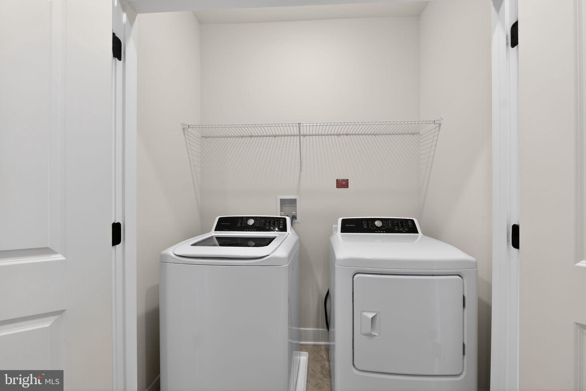 4300 Roland Heights Avenue Baltimore, MD 21211 - Photo 25 of 37 a room with storage and utility