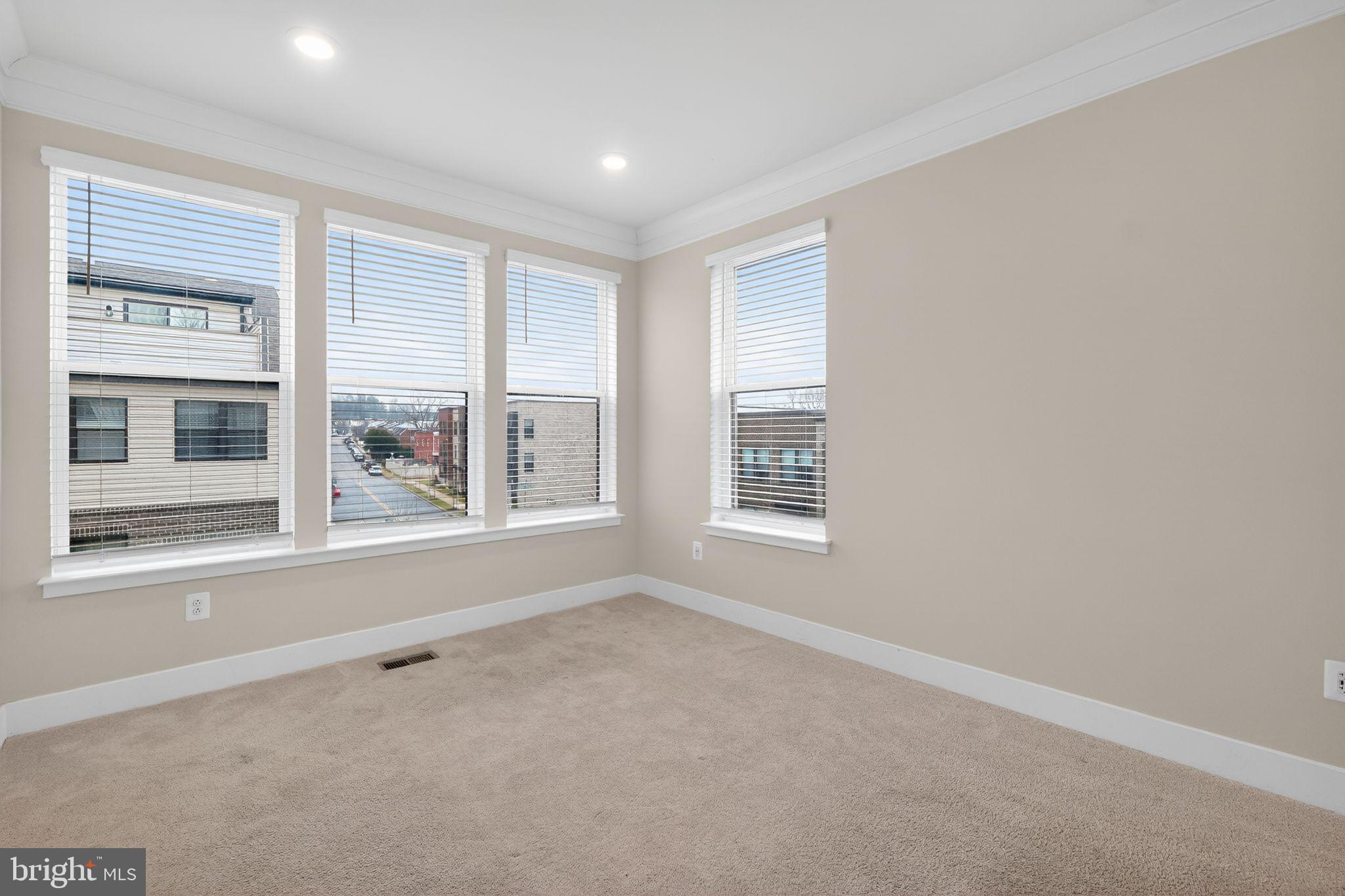 4300 Roland Heights Avenue Baltimore, MD 21211 - Photo 30 of 37 an empty room with a window