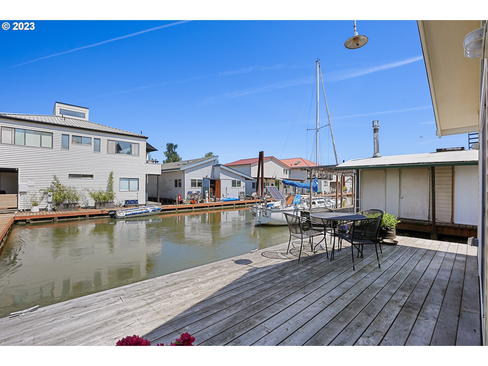 205 North Bridgeton Road, Unit 6 Portland, OR 97217 - Photo 20 of 22 a view of a house with pool and sitting area