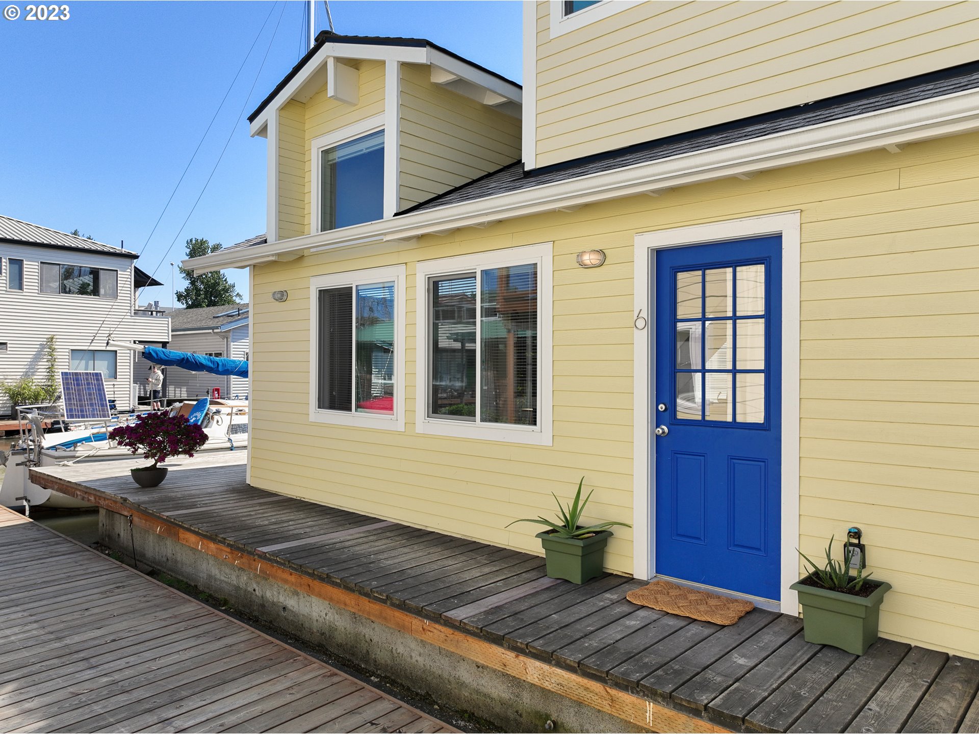 205 North Bridgeton Road, Unit 6 Portland, OR 97217 - Photo 2 of 22 a front view of a house having yard