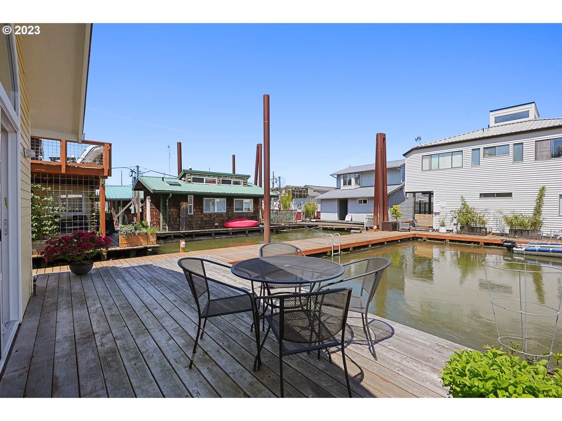 205 North Bridgeton Road, Unit 6 Portland, OR 97217 - Photo 21 of 22 a view of a swimming pool with seating area