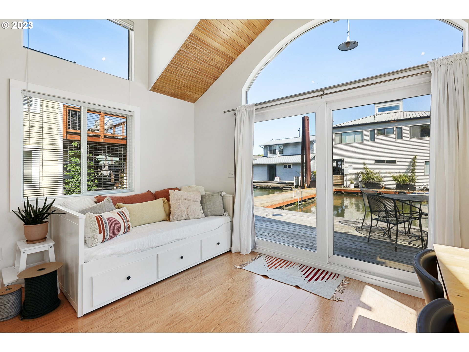205 North Bridgeton Road, Unit 6 Portland, OR 97217 - Photo 8 of 22 a living room with furniture and a flat screen tv