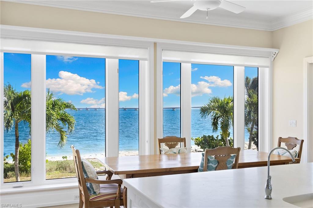 1069 Bird Lane Sanibel, FL 33957 - Photo 12 of 46 a view of a dining room with furniture window and outside view