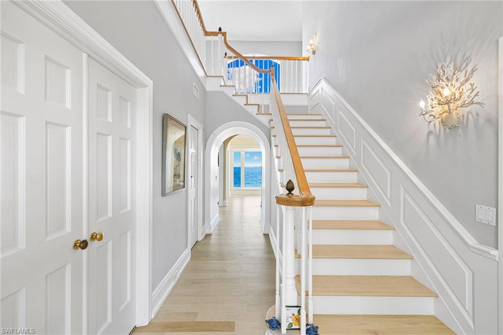 1069 Bird Lane Sanibel, FL 33957 - Photo 13 of 46 a view of entryway and hall with wooden floor