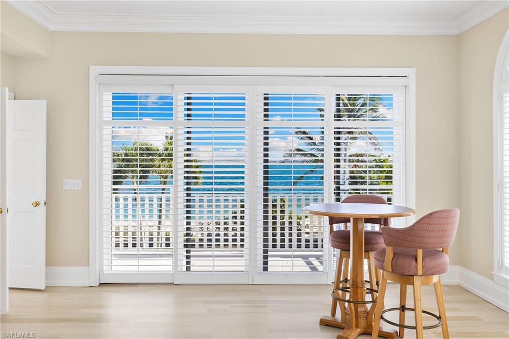 1069 Bird Lane Sanibel, FL 33957 - Photo 20 of 46 a view of a chair and table in the room