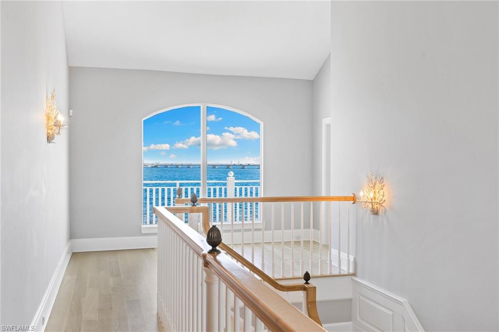 1069 Bird Lane Sanibel, FL 33957 - Photo 22 of 46 a view of staircase with a rug