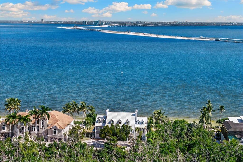 1069 Bird Lane Sanibel, FL 33957 - Photo 40 of 46 a view of a lake and outdoor space
