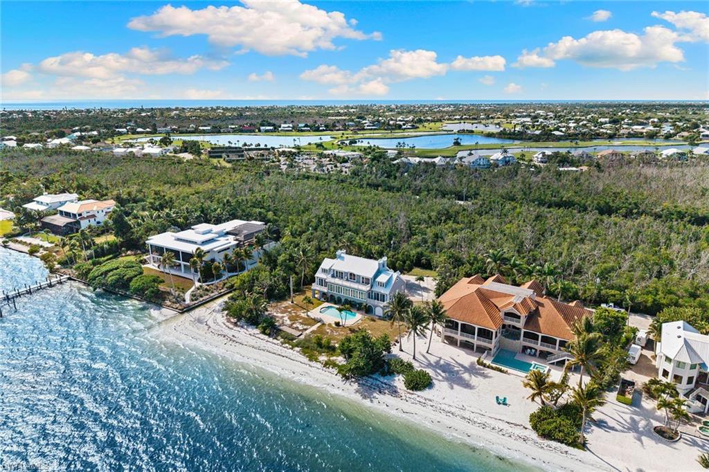 1069 Bird Lane Sanibel, FL 33957 - Photo 43 of 46 an aerial view of a house with a garden