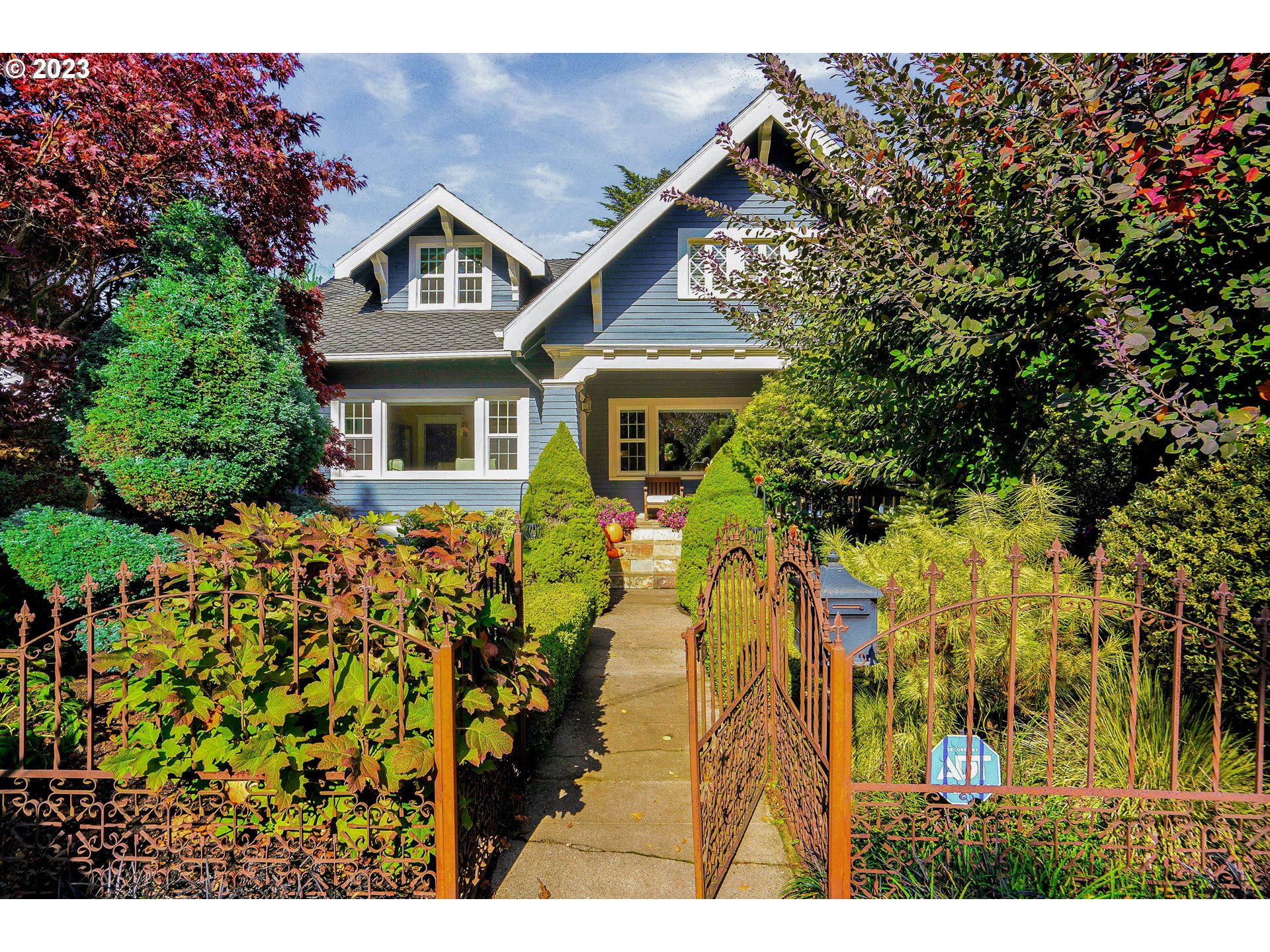 810 North Water Street Silverton, OR 97381 - Photo 1 of 48 a front view of a house with a yard