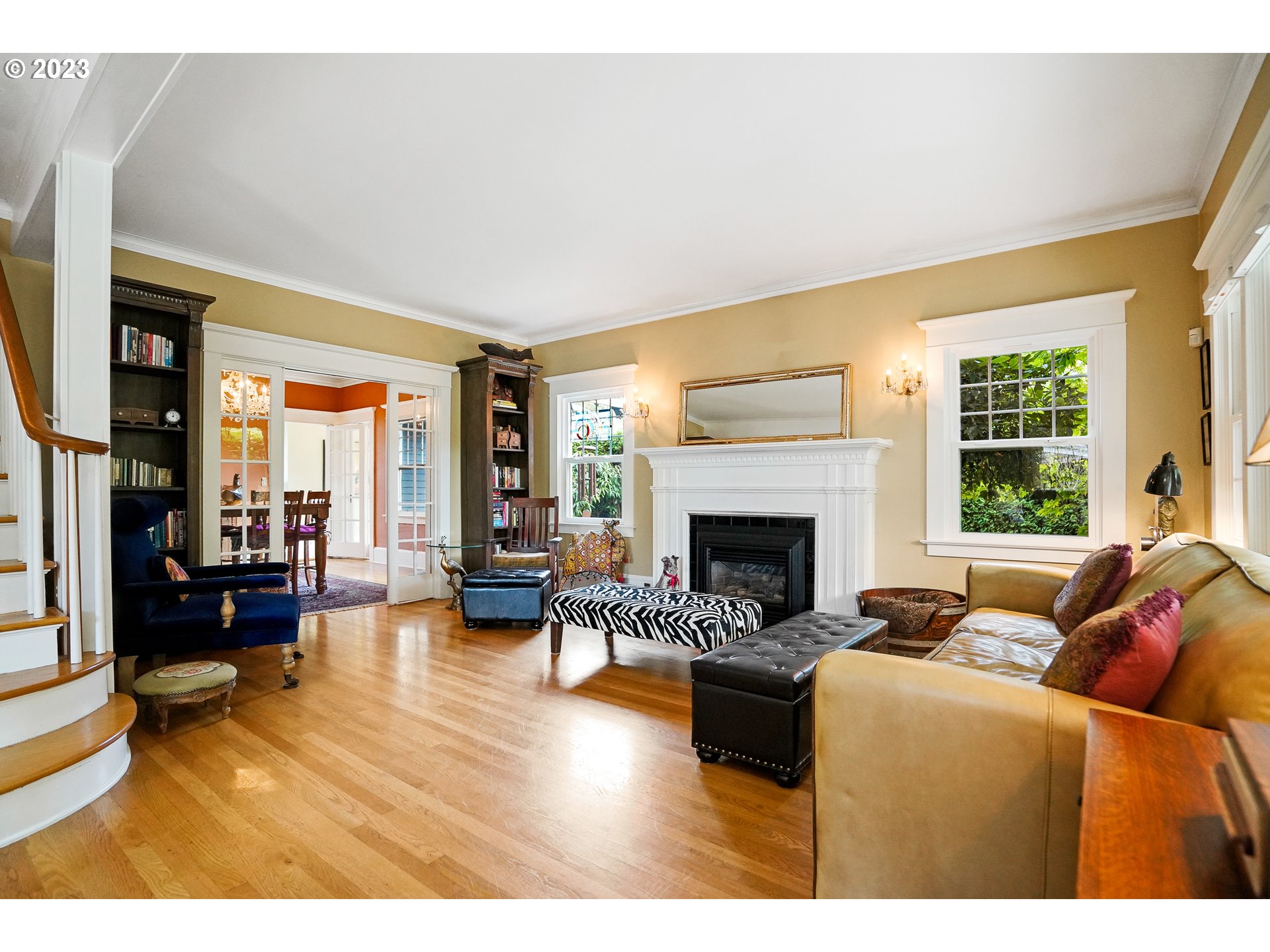 810 North Water Street Silverton, OR 97381 - Photo 11 of 48 a living room with furniture and a fireplace