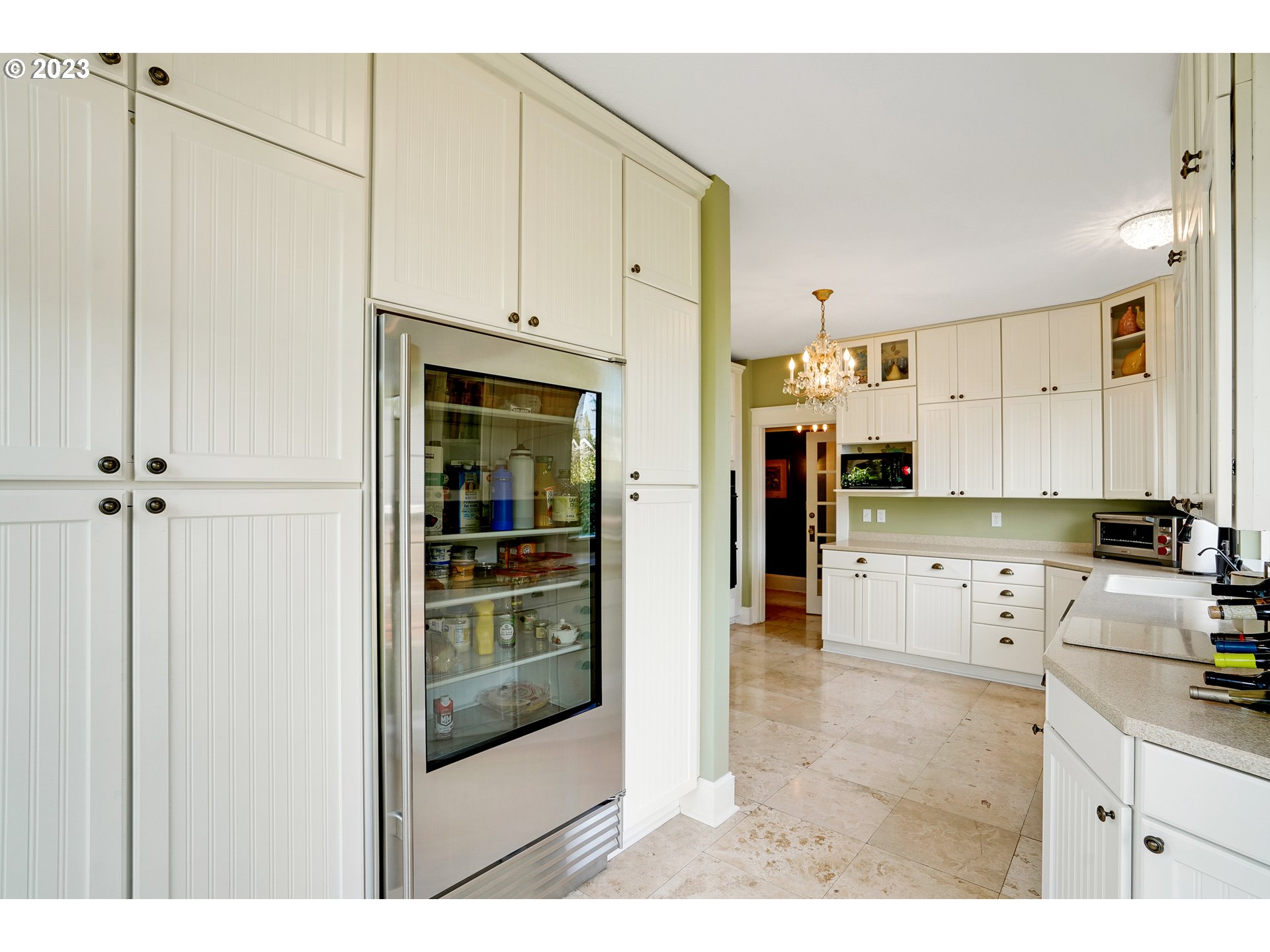 810 North Water Street Silverton, OR 97381 - Photo 18 of 48 a kitchen with cabinets and a refrigerator