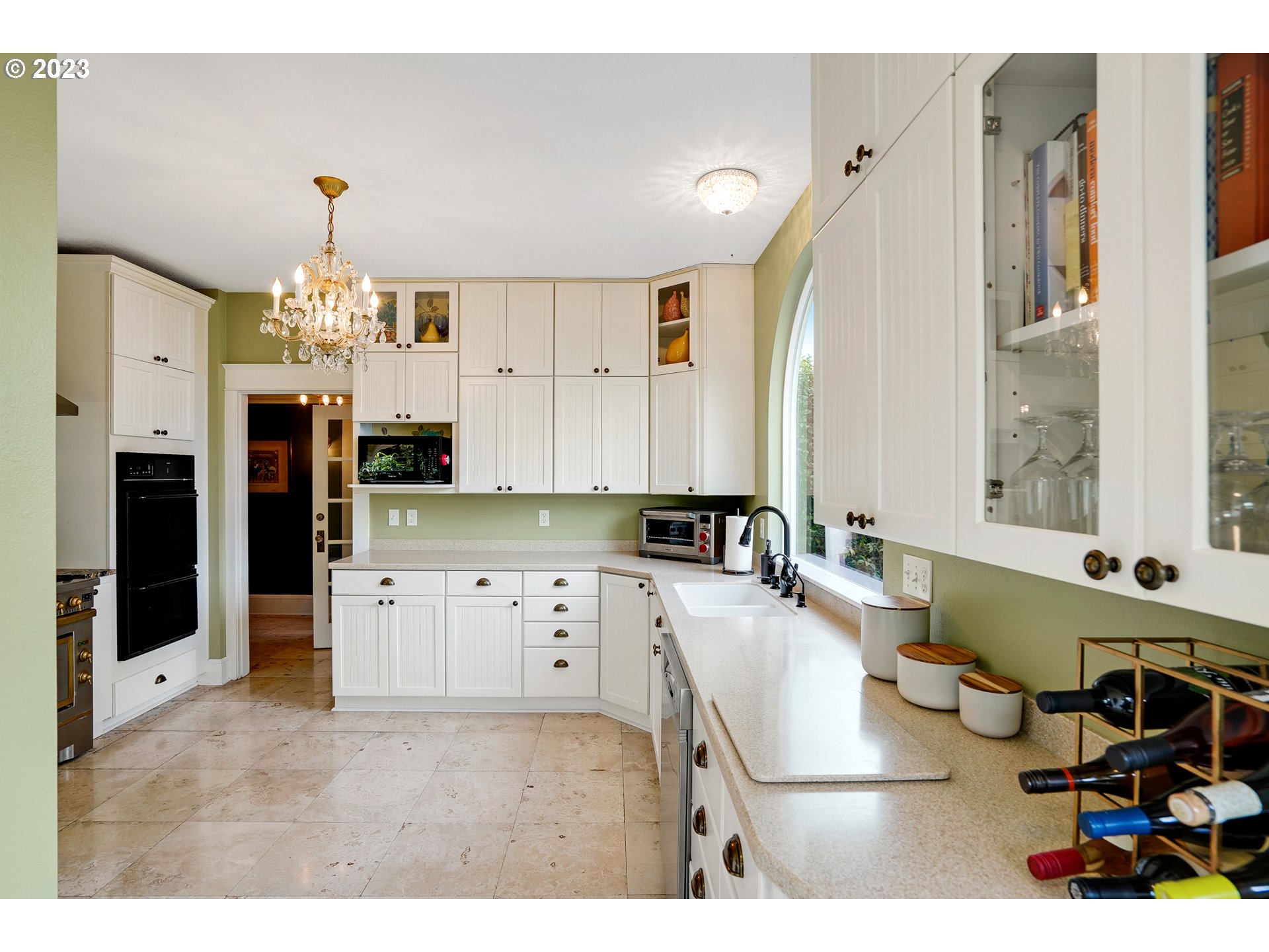810 North Water Street Silverton, OR 97381 - Photo 19 of 48 a kitchen that has a lot of cabinets a sink and a stove