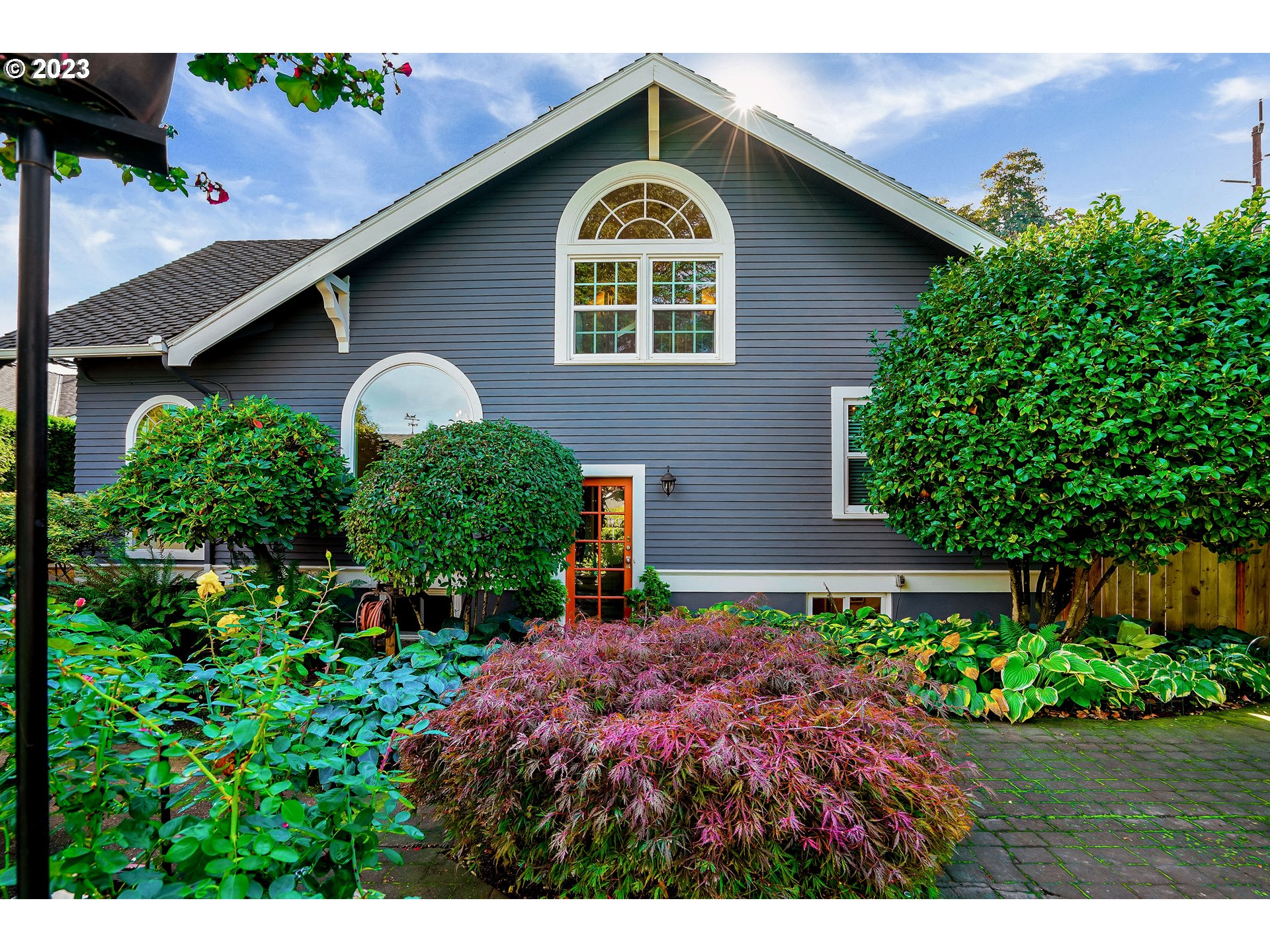 810 North Water Street Silverton, OR 97381 - Photo 46 of 48 a front view of a house with a yard