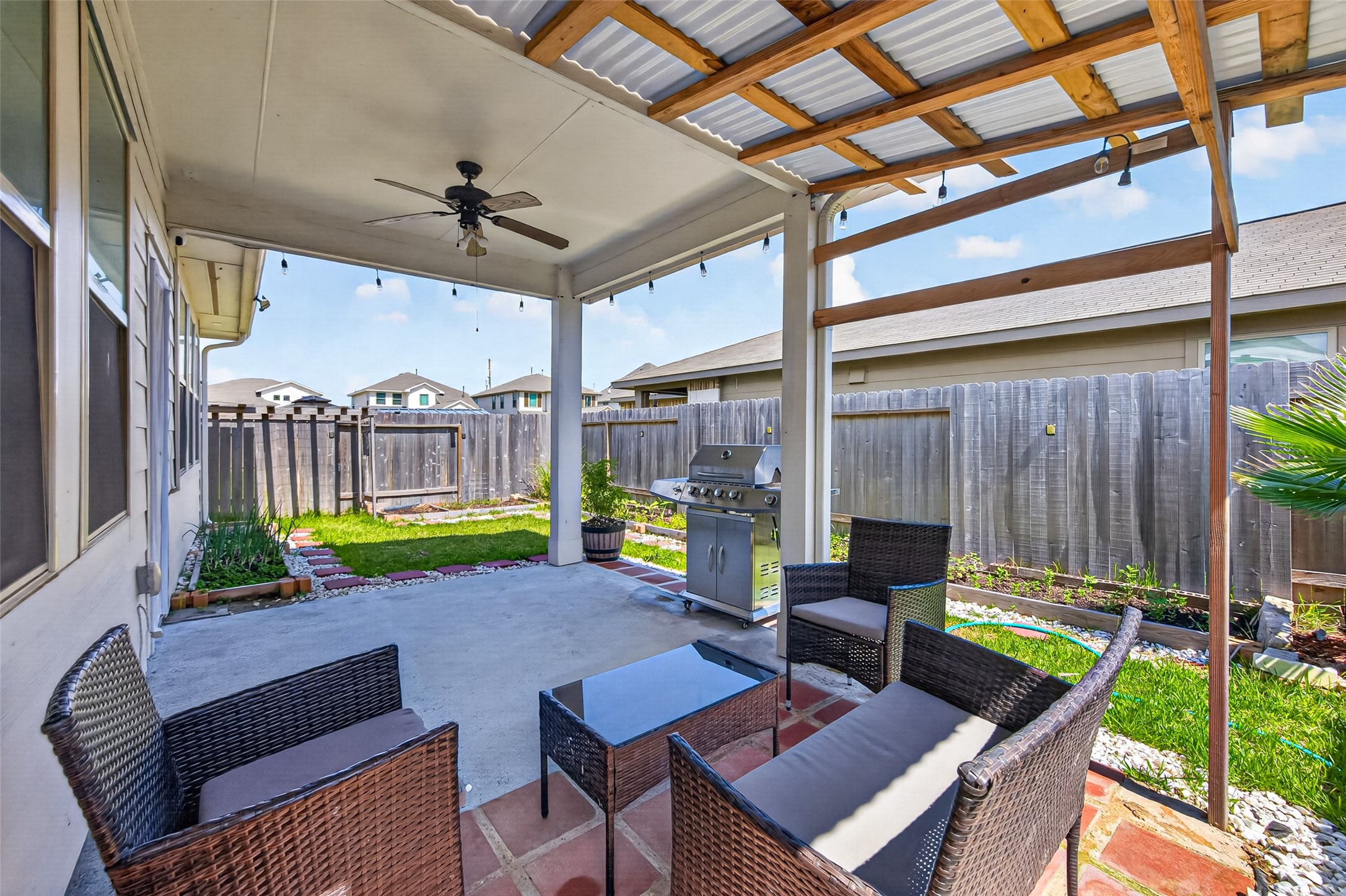 22409 Kinley Street New Caney, TX 77357 - Photo 43 of 46 a building outdoor space with patio furniture