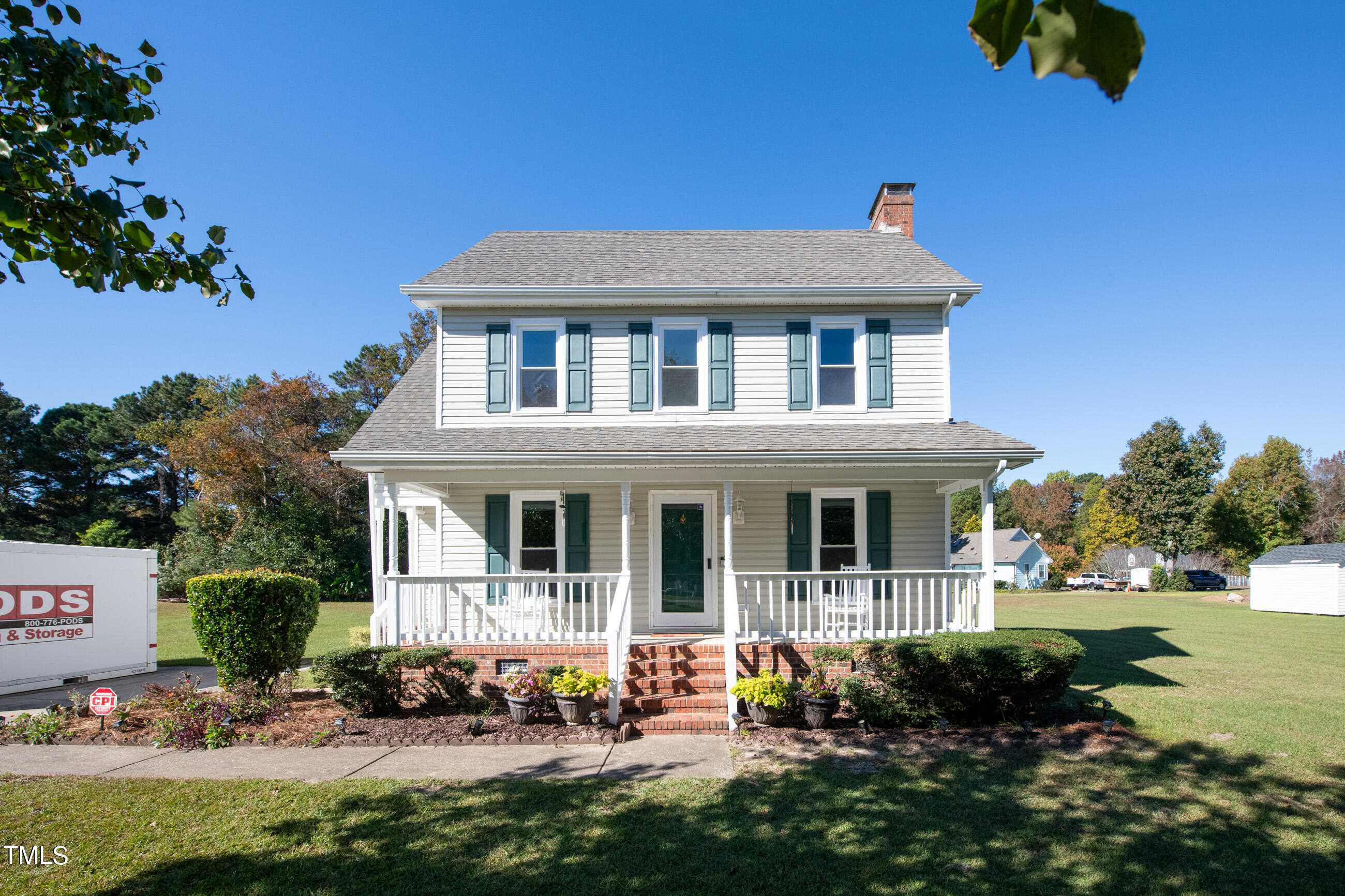 10024 Joe Leach Road Raleigh, NC 27603 - Photo 18 of 26 a front view of a house with garden